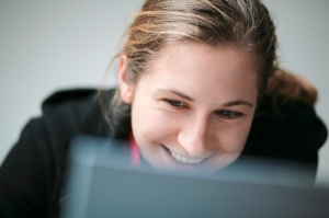 woman searching the Internet on a laptop computer